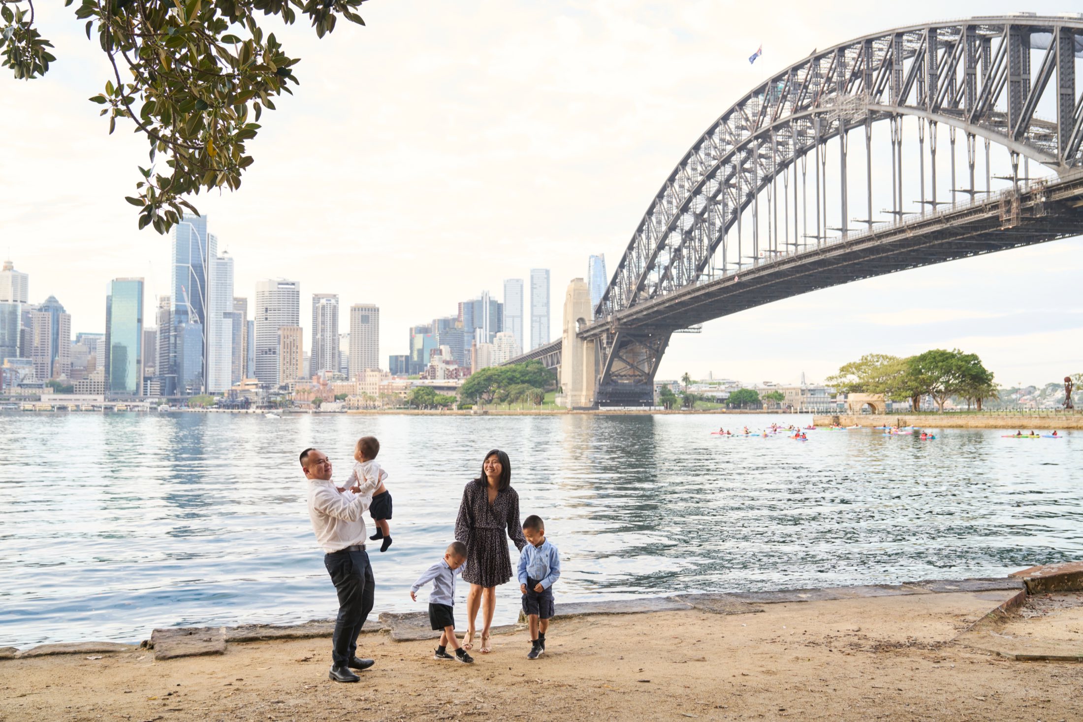 Bach Ly and his family on Sydney Harbour